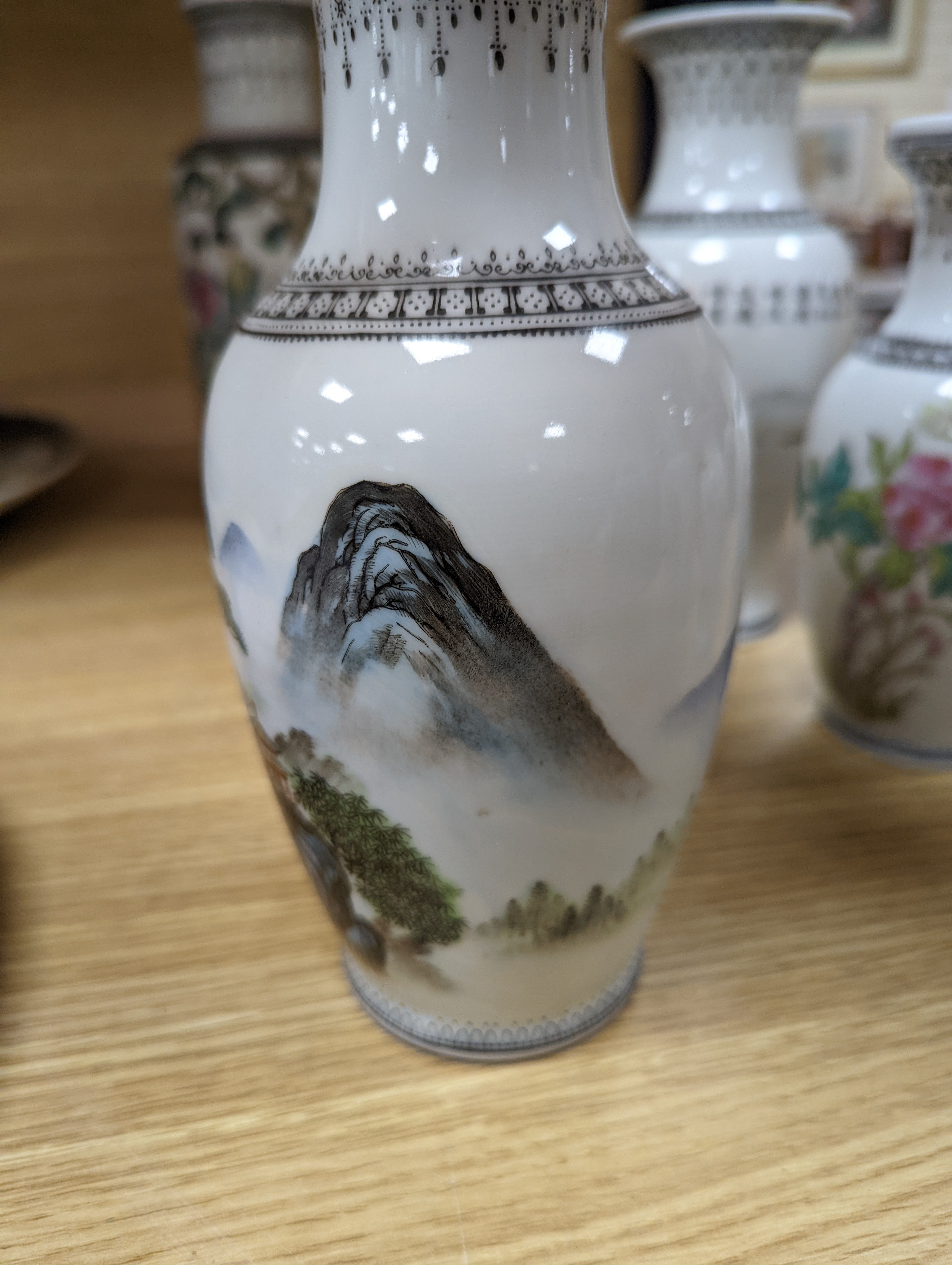 A group of seven Chinese famille rose vases, 20th century